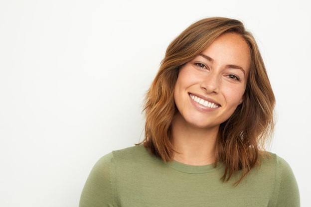 a patient smiling in Edmonton, AB